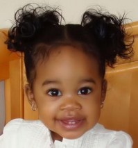 beautiful_black_baby_girl_with_her_pretty_hairstyle_with_a_sweet_smile